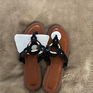 Elegant Black Sandals with Gold Accents